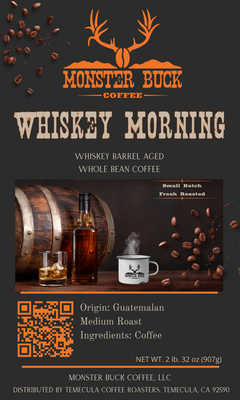 Monster Buck Coffee’s whiskey morning coffee label with a camper coffee mug and a whiskey barrel.